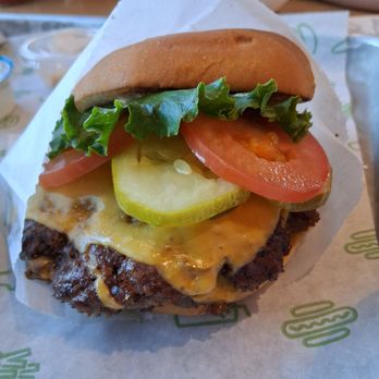 Shake Shack Naperville - Double Shack burger ($10.25): two patties, cheese, lettuce, tomato, pickles and special sauce on a potato bun - Ice Cream & Frozen Yogurt Near Me - Naperville, Illinois Shake Shack Naperville - Double Shack burger ($10.25): two patties, cheese, lettuce, tomato, pickles and special sauce on a potato bun - Ice Cream & Frozen Yogurt Near Me - Naperville, Illinois