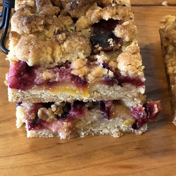 Baked - a stack of cranberry bars on a wooden table - Bakeries Near Me - Emmaus, Pennsylvania