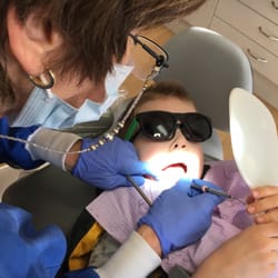 Forum Dental Group - Watching the process as we learn about plaque.