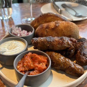 Rose Mary - Cevapi. Good value dish: rich and strong flavors, fun to make little sausage and pepper sandwiches with the bread. - Italian Near Me - Chicago, Illinois Rose Mary - Cevapi. Good value dish: rich and strong flavors, fun to make little sausage and pepper sandwiches with the bread. - Italian Near Me - Chicago, Illinois