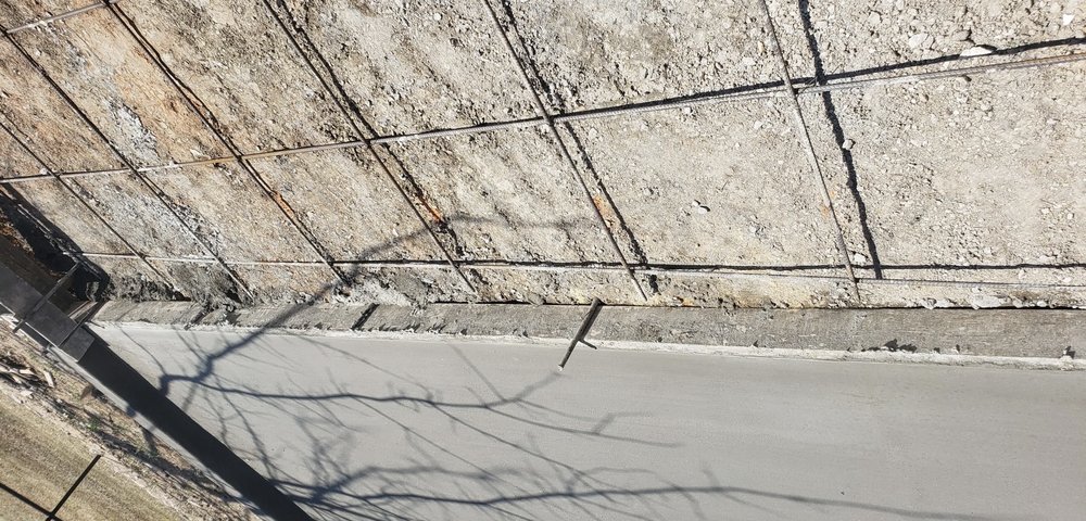 Slide of Harry's Roofing and Construction