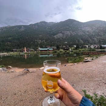 Cabin Creek Brewing - Outside patio with a draft cider - Breweries Near Me - Georgetown, Colorado