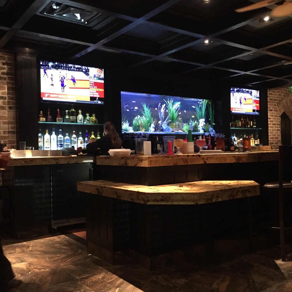 Cheddar's Scratch Kitchen - The place has lots of fish tanks! - American Near Me - Daytona Beach, Florida
