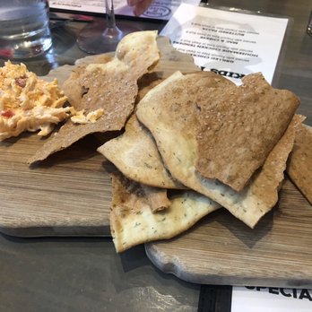 Hook & Barrel - On the House salted chips and a cheesy dip. - Seafood Near Me - Myrtle Beach, South Carolina
