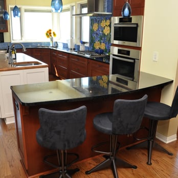Creative Kitchen Design - Cherry cabinetry with custom glass mosaic backsplash tile work - Interior Design Near Me