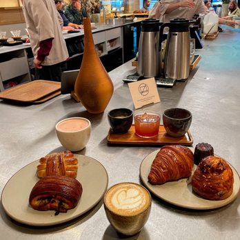 La Cabra - hot coco, flight set, latte, ham and cheese croissant, pain suisse, plain croissant, cannele, cardamom bun - Coffee & Tea Near Me - New York, New York La Cabra - hot coco, flight set, latte, ham and cheese croissant, pain suisse, plain croissant, cannele, cardamom bun - Coffee & Tea Near Me - New York, New York