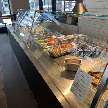 CAVA - a buffet with a variety of food items - Salad Near Me - New York, New York CAVA - a buffet with a variety of food items - Salad Near Me - New York, New York