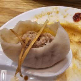 Pork Soup dumplings with sliced ginger Pork Soup dumplings with sliced ginger