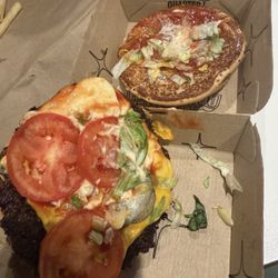 McDonald's - Burnt quarter pounder deluxe . What a joke!
