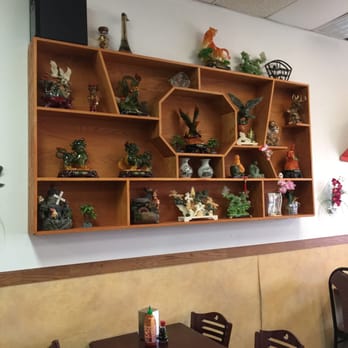 New China Buffet - a shelf full of figurines - Chinese Near Me - South Bend, Indiana New China Buffet - a shelf full of figurines - Chinese Near Me - South Bend, Indiana