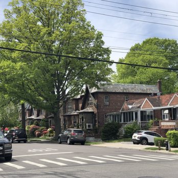Marino's Supermarket - a row of houses on a residential street - Grocery Near Me - Flushing, New York
