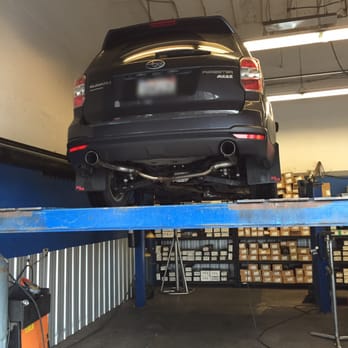 Muffler Tech - Fitting a resonator. - Auto Repair Near Me - Sacramento, California Muffler Tech - Fitting a resonator. - Auto Repair Near Me - Sacramento, California