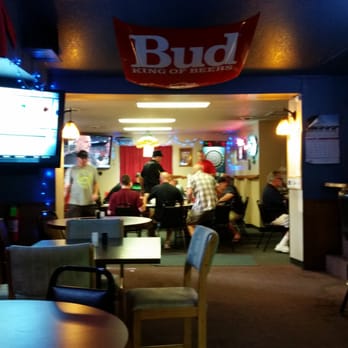 Waters Edge - a bar with people sitting at tables - Bars Near Me - Polk City, Iowa Waters Edge - a bar with people sitting at tables - Bars Near Me - Polk City, Iowa