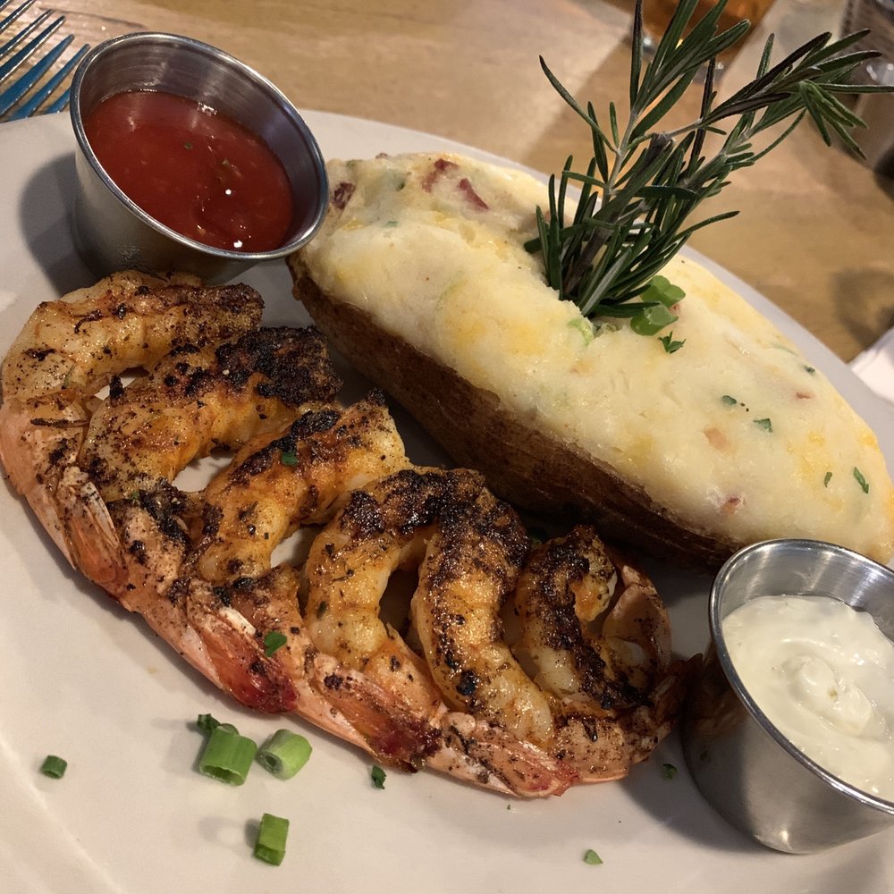 Joyce's Seafood & Steaks - Blackened shrimp with twice baked potato - Seafood Near Me - Houston, Texas Joyce's Seafood & Steaks - Blackened shrimp with twice baked potato - Seafood Near Me - Houston, Texas