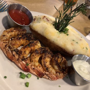 Joyce's Seafood & Steaks - Blackened shrimp with twice baked potato - Seafood Near Me - Houston, Texas Joyce's Seafood & Steaks - Blackened shrimp with twice baked potato - Seafood Near Me - Houston, Texas