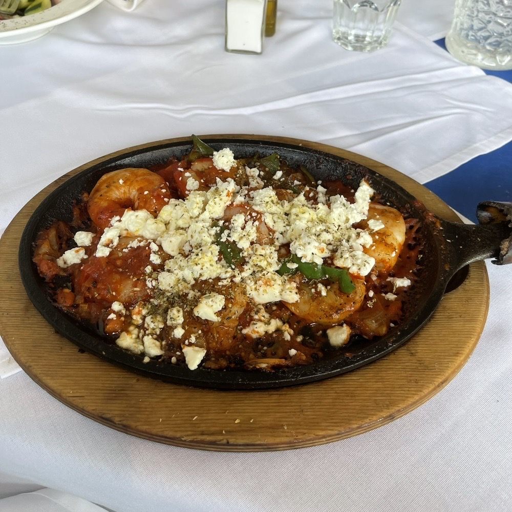 Petos - Shrimp Saganaki. (The photo doesn't really do it justice.) - Greek Near Me - Carmel, Indiana Petos - Shrimp Saganaki. (The photo doesn't really do it justice.) - Greek Near Me - Carmel, Indiana
