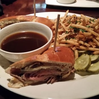 Yard House - Roast Beef Dip with Swiss Cheese and truffle fries - New American Near Me - Riverside, California Yard House - Roast Beef Dip with Swiss Cheese and truffle fries - New American Near Me - Riverside, California