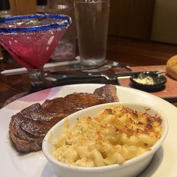 LongHorn Steakhouse - Ribeye cooked medium with Steakhouse Mac & Cheese and a patron dragon fruit margarita - Steakhouses Near Me - Houston, Texas LongHorn Steakhouse - Ribeye cooked medium with Steakhouse Mac & Cheese and a patron dragon fruit margarita - Steakhouses Near Me - Houston, Texas