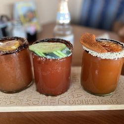 Dos Mundos Kitchen - Michelada Flight. Bigger than the shot glass size.