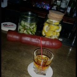 The Leaky Lifeboat Inn - Dildo on the table....disgusting and I wouldn't doubt these people using it. Last time it was suction cupped to the mirror behind the bar