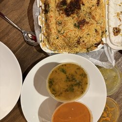 Tandoori Nights - From top to bottom is chicken biryani, daal and chicken tikka masala.