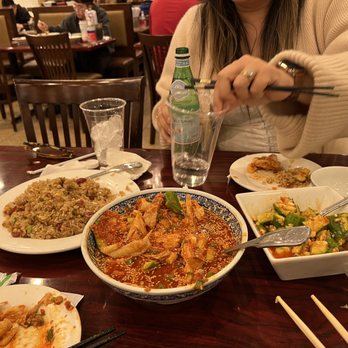 Yummeet Hunan Restaurant - a woman eating a meal - Chinese Near Me - Rosemead, California Yummeet Hunan Restaurant - a woman eating a meal - Chinese Near Me - Rosemead, California