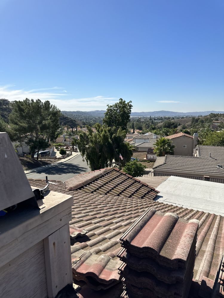 Slide of EZ Roof Repairs