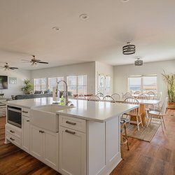 Brunswick Cabinets and Countertops - Coastal Kitchen Island with Waypoint Cabinetry and Quartz Statuario Countertops in OIB