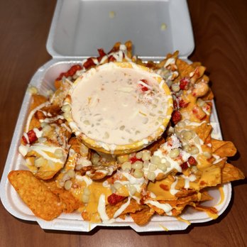 Comedor y Panaderia La Tapatia - a tray of nachos - Mexican Near Me - Phoenix, Arizona Comedor y Panaderia La Tapatia - a tray of nachos - Mexican Near Me - Phoenix, Arizona