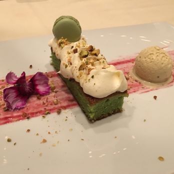 Potente - Torta al pistachio (pistachio pound cake, ginger macaron, pistachio gelato, raspberry) - Italian Near Me - Houston, Texas Potente - Torta al pistachio (pistachio pound cake, ginger macaron, pistachio gelato, raspberry) - Italian Near Me - Houston, Texas