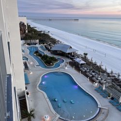 Pool plus lazy river and beach bar.
