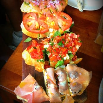 Postino Arcadia - Bruschetta - Smoked salmon pesto, mozzarella/basil/tomato, Buratta, bacon, & arugula and Prosciutto fig & marscapone - Wine Bars Near Me - Phoenix, Arizona