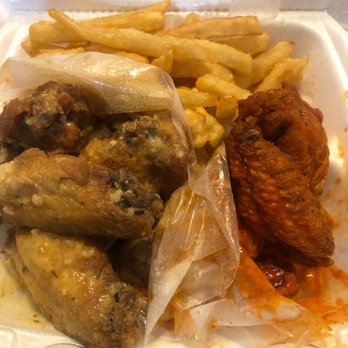 Chicago Fish Chicken Gyro - chicken wings and fries in a styrofoam container - Chicken Wings Near Me - Indianapolis, Indiana