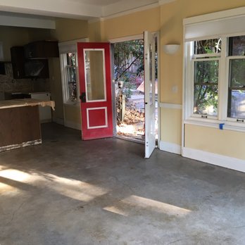 JC Concrete Polishing - an empty room with a red door - Masonry/Concrete Near Me - Ft Lauderdale, Florida JC Concrete Polishing - an empty room with a red door - Masonry/Concrete Near Me - Ft Lauderdale, Florida