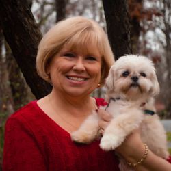 Cindy Fox & Company - Cindy & Spanky (Spanky has made the office his home and has been working with the team for 15 years now!)