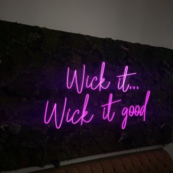 The Wick Lab - A purple neon sign in the back of the shop. "Wick it... Wick it good" - Arts & Crafts Near Me - Provo, Utah