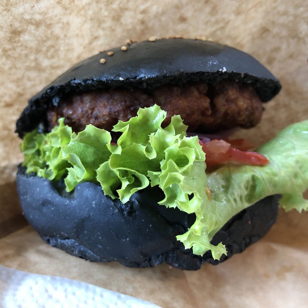 Tofu burger with black bun Tofu burger with black bun