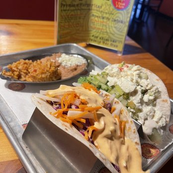 Red Mesa Grill - Vietnamese pork taco (closest) and Shawarma Taco with beans and rice. - Mexican Near Me - Traverse City, Michigan Red Mesa Grill - Vietnamese pork taco (closest) and Shawarma Taco with beans and rice. - Mexican Near Me - Traverse City, Michigan