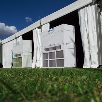 Portable Air - Some of our vertical HVAC units being set up at an outdoor tented concert hall. - Party Equipment Rentals Near Me - Cocoa, Florida