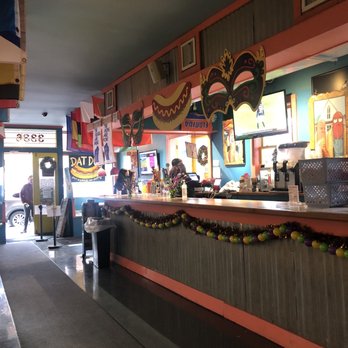 Dat Dog - Festive Mardi Gras environment - Hot Dogs Near Me - New Orleans, Louisiana Dat Dog - Festive Mardi Gras environment - Hot Dogs Near Me - New Orleans, Louisiana