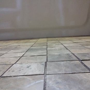 M.A. Home Improvements - tiles not lined up, grout lines not equally space,floor not laid level - General Contractors Near Me - Monroeville, Pennsylvania