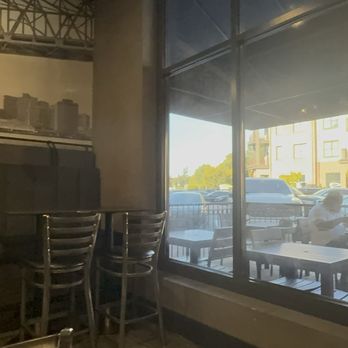 D'juan's Bistro - Exterior peek & interior high table seating. - Soul Food Near Me - Smyrna, Georgia D'juan's Bistro - Exterior peek & interior high table seating. - Soul Food Near Me - Smyrna, Georgia