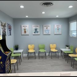 Magic Smiles For Kids - Our waiting area. Everyone gets a chance to beat our high score at Pac-man