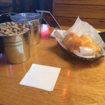 Texas Roadhouse - Peanuts and yummy rolls with cinnamon honey butter. - Barbeque Near Me - Anchorage, Alaska