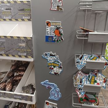 Love's Travel Stop - a refrigerator with stickers on it - Convenience Stores Near Me - Marshall, Michigan