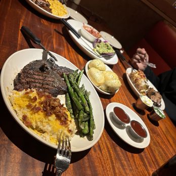 Wood Ranch Ventura - Rib Eye, loaded mashed potatoes, asparagus, ribs, and smoked brisket with barbecue cranberry sauce. - Barbeque Near Me - Ventura, California