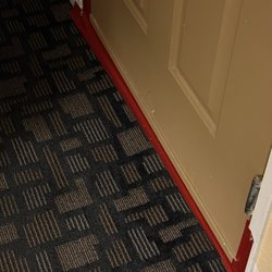 Marinwood Inn & Suites - Red tape to keep the light out from the adjoining room