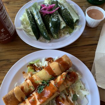 Slapfish - 2 Pieces Lobster Taquitos and fresh chilled Housemade Pickles - Seafood Near Me - Park City, Utah Slapfish - 2 Pieces Lobster Taquitos and fresh chilled Housemade Pickles - Seafood Near Me - Park City, Utah