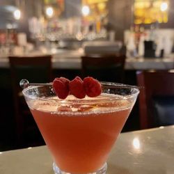 Fork With IT - French Martini garnished with fresh raspberries