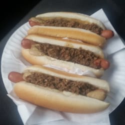 Cals Hotdogs - Chili dogs with mustard.